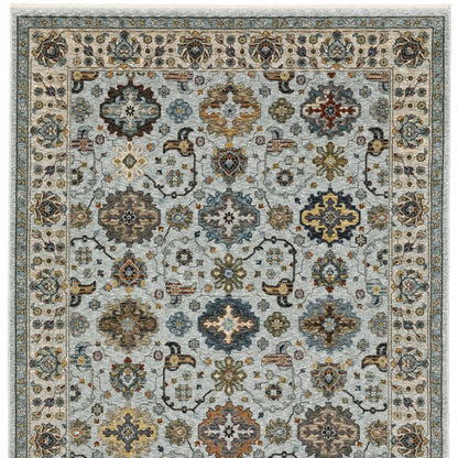 3' X 5' Blue Beige Grey Green Yellow And Rust Oriental Power Loom Stain Resistant Area Rug With Fringe