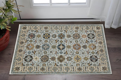 3' X 5' Blue Beige Grey Green Yellow And Rust Oriental Power Loom Stain Resistant Area Rug With Fringe