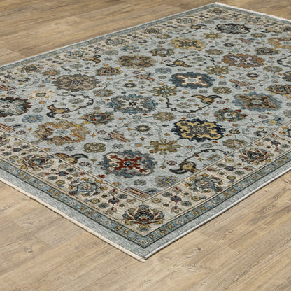 10' X 13' Blue Beige Grey Green Yellow And Rust Oriental Power Loom Stain Resistant Area Rug With Fringe