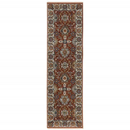 2' X 8' Red Blue Ivory Gold And Navy Oriental Power Loom Stain Resistant Runner Rug With Fringe