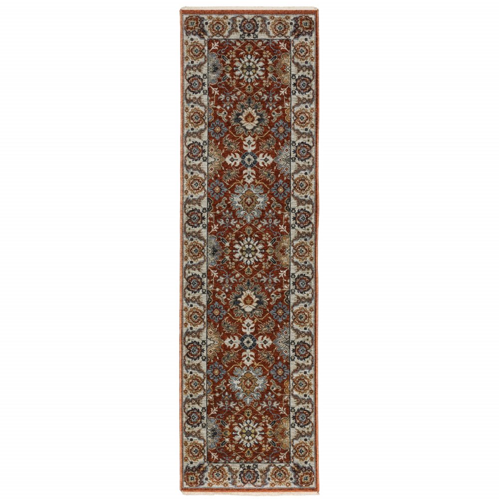 2' X 8' Red Blue Ivory Gold And Navy Oriental Power Loom Stain Resistant Runner Rug With Fringe
