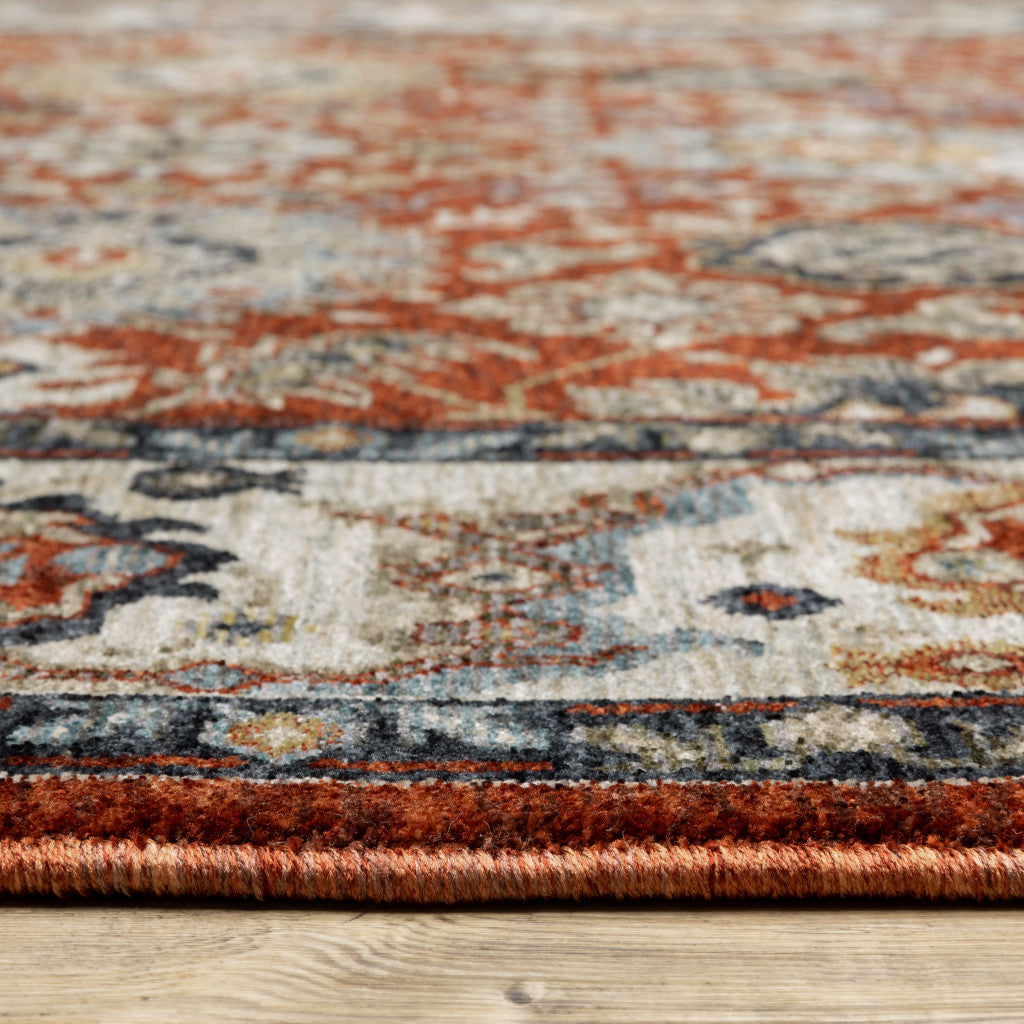 2' X 8' Red Blue Ivory Gold And Navy Oriental Power Loom Stain Resistant Runner Rug With Fringe