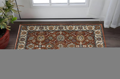 2' X 3' Red Blue Ivory Gold And Navy Oriental Power Loom Stain Resistant Area Rug With Fringe
