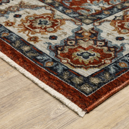 2' X 3' Red Blue Ivory Gold And Navy Oriental Power Loom Stain Resistant Area Rug With Fringe