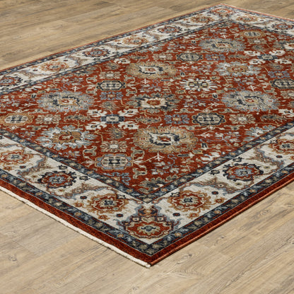 2' X 3' Red Blue Ivory Gold And Navy Oriental Power Loom Stain Resistant Area Rug With Fringe