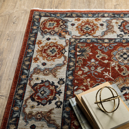 2' X 3' Red Blue Ivory Gold And Navy Oriental Power Loom Stain Resistant Area Rug With Fringe