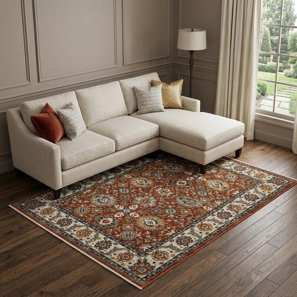 7' X 10' Red Ivory And Orange Oriental Area Rug With Fringe