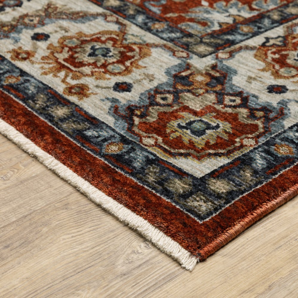 7' X 10' Red Ivory And Orange Oriental Area Rug With Fringe