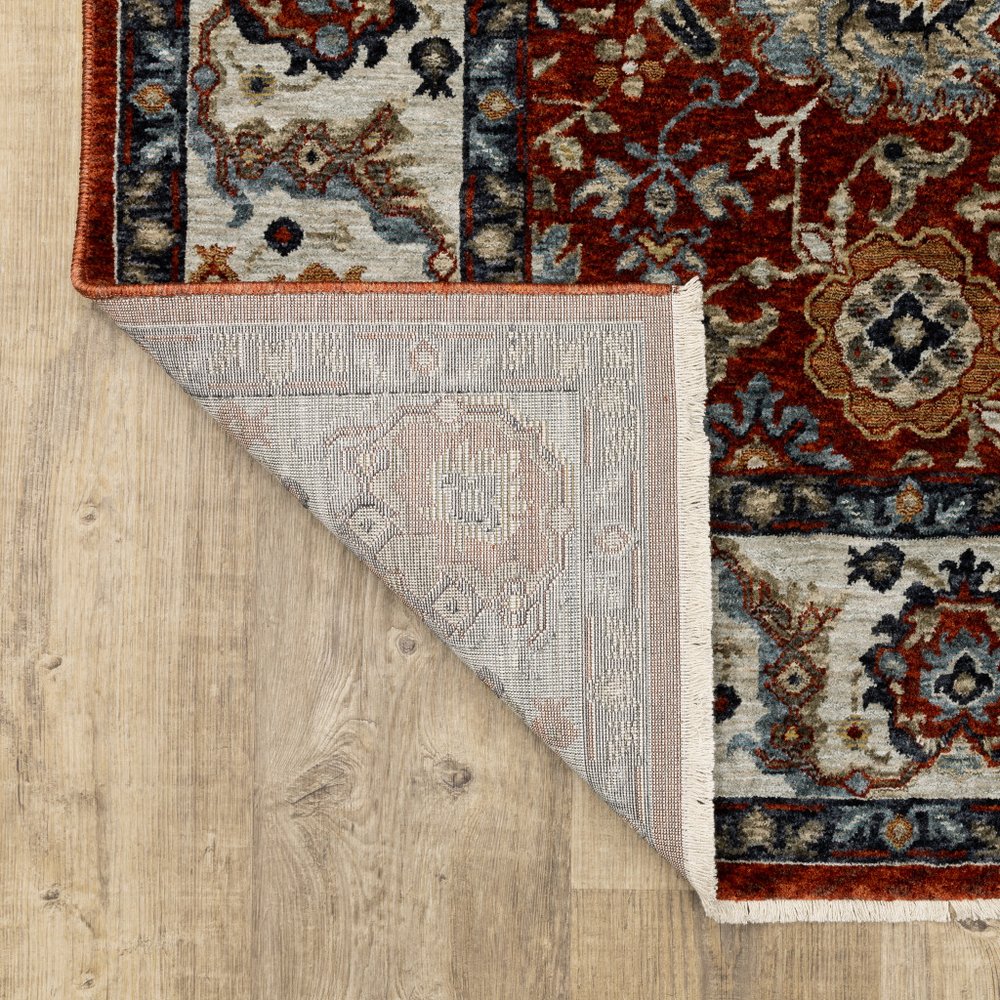 7' X 10' Red Ivory And Orange Oriental Area Rug With Fringe