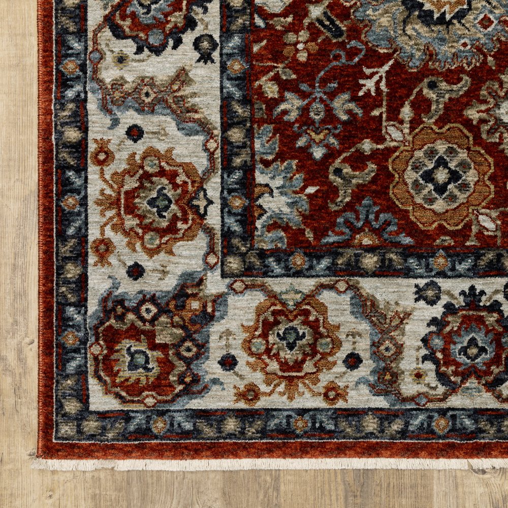 7' X 10' Red Ivory And Orange Oriental Area Rug With Fringe