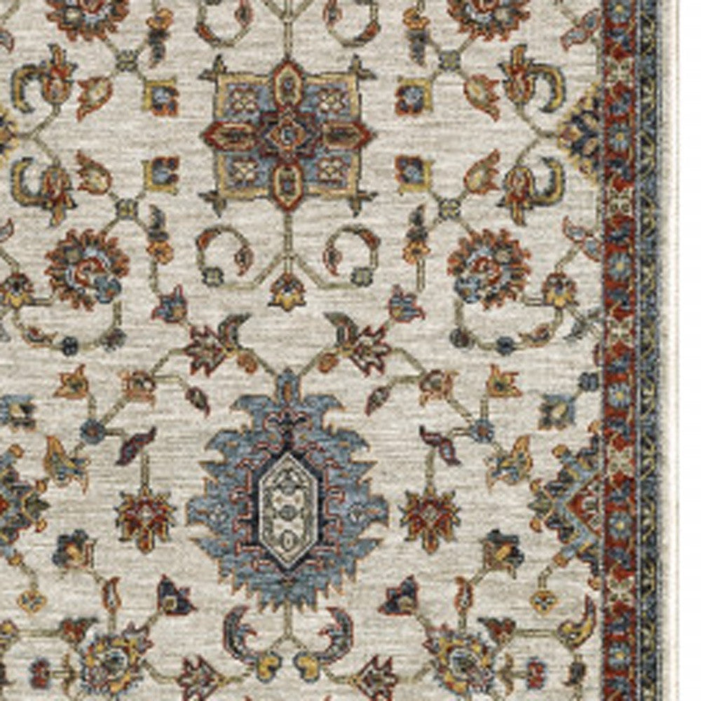 2' X 8' Beige Rust Red Blue Gold And Grey Oriental Power Loom Stain Resistant Runner Rug With Fringe