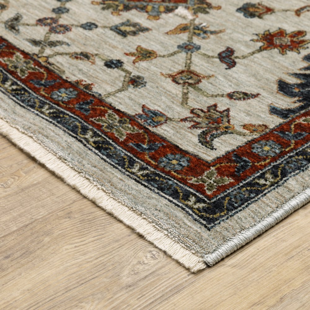 2' X 8' Beige Rust Red Blue Gold And Grey Oriental Power Loom Stain Resistant Runner Rug With Fringe