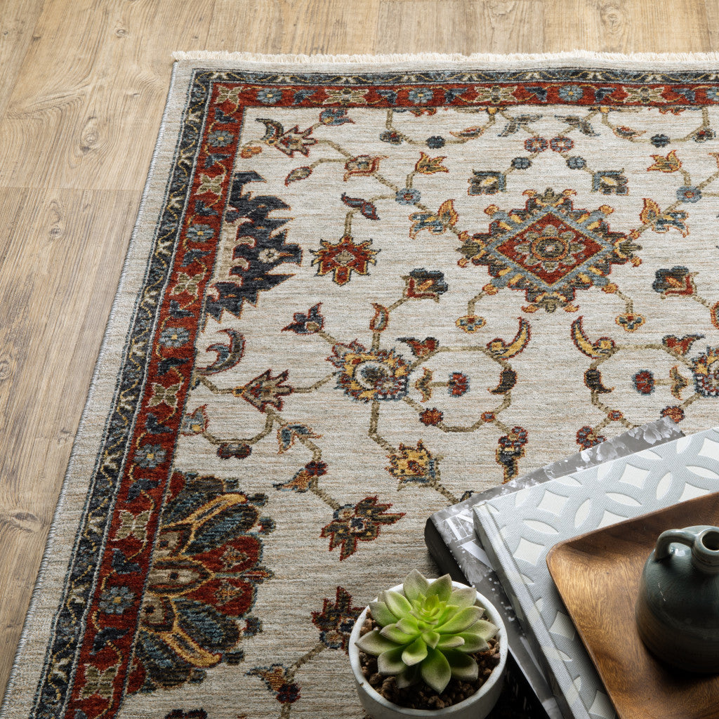 2' X 8' Beige Rust Red Blue Gold And Grey Oriental Power Loom Stain Resistant Runner Rug With Fringe