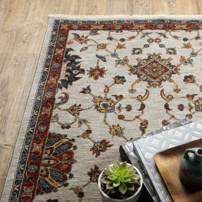 2' X 8' Beige Rust Red Blue Gold And Grey Oriental Power Loom Stain Resistant Runner Rug With Fringe