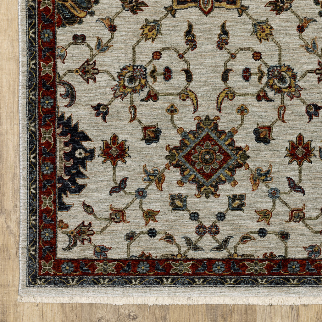 2' X 8' Beige Rust Red Blue Gold And Grey Oriental Power Loom Stain Resistant Runner Rug With Fringe