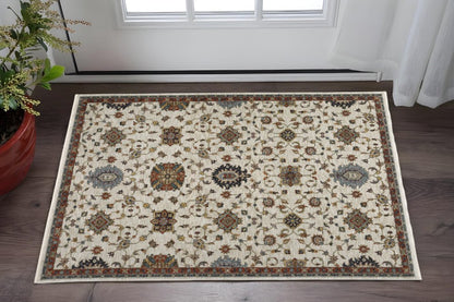 2' X 3' Ivory Grey Rust Red Gold And Shades Of Blue Oriental Power Loom Stain Resistant Area Rug With Fringe