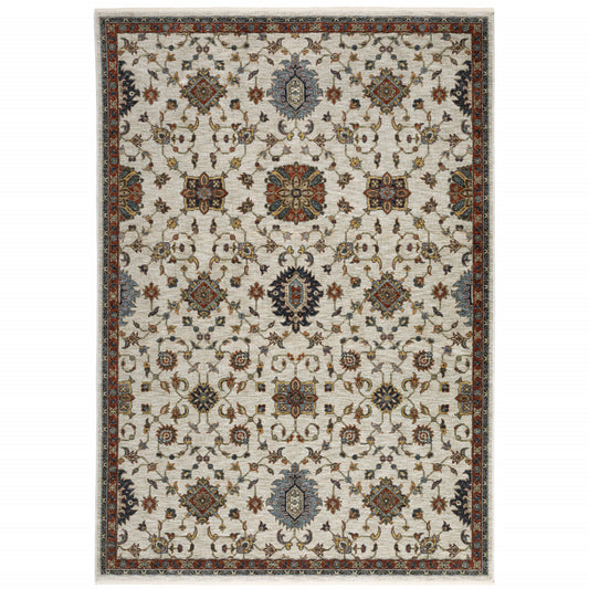 6' X 9' Beige Rust Red Blue Gold And Grey Oriental Power Loom Stain Resistant Area Rug With Fringe