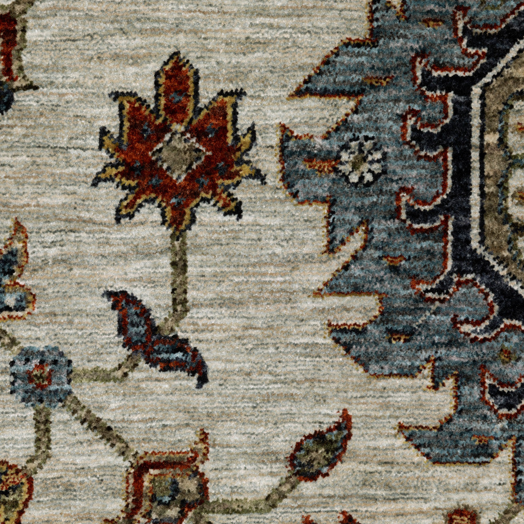 8' X 11' Beige Rust Red Blue Gold And Grey Oriental Power Loom Stain Resistant Area Rug With Fringe