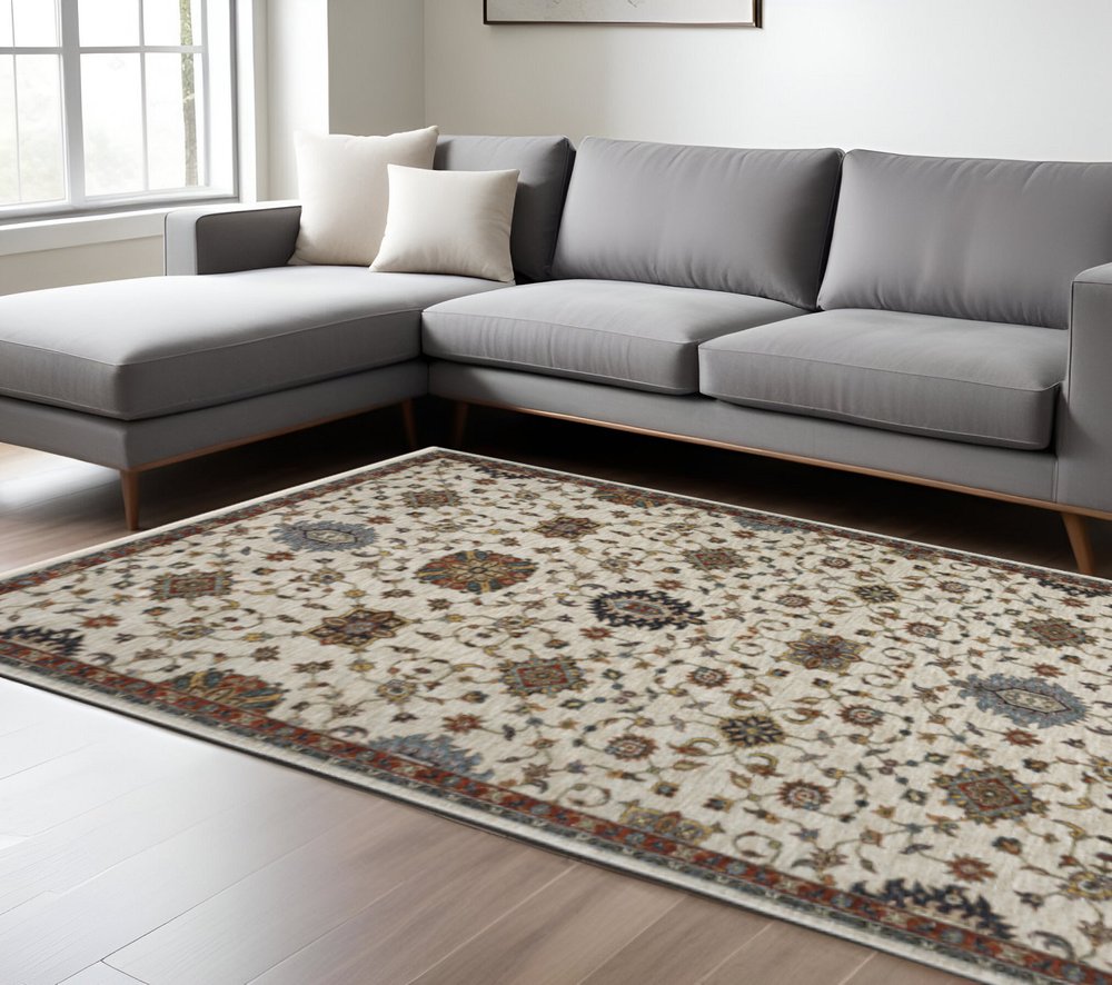 10' X 13' Beige Rust Red Blue Gold And Grey Oriental Power Loom Stain Resistant Area Rug With Fringe