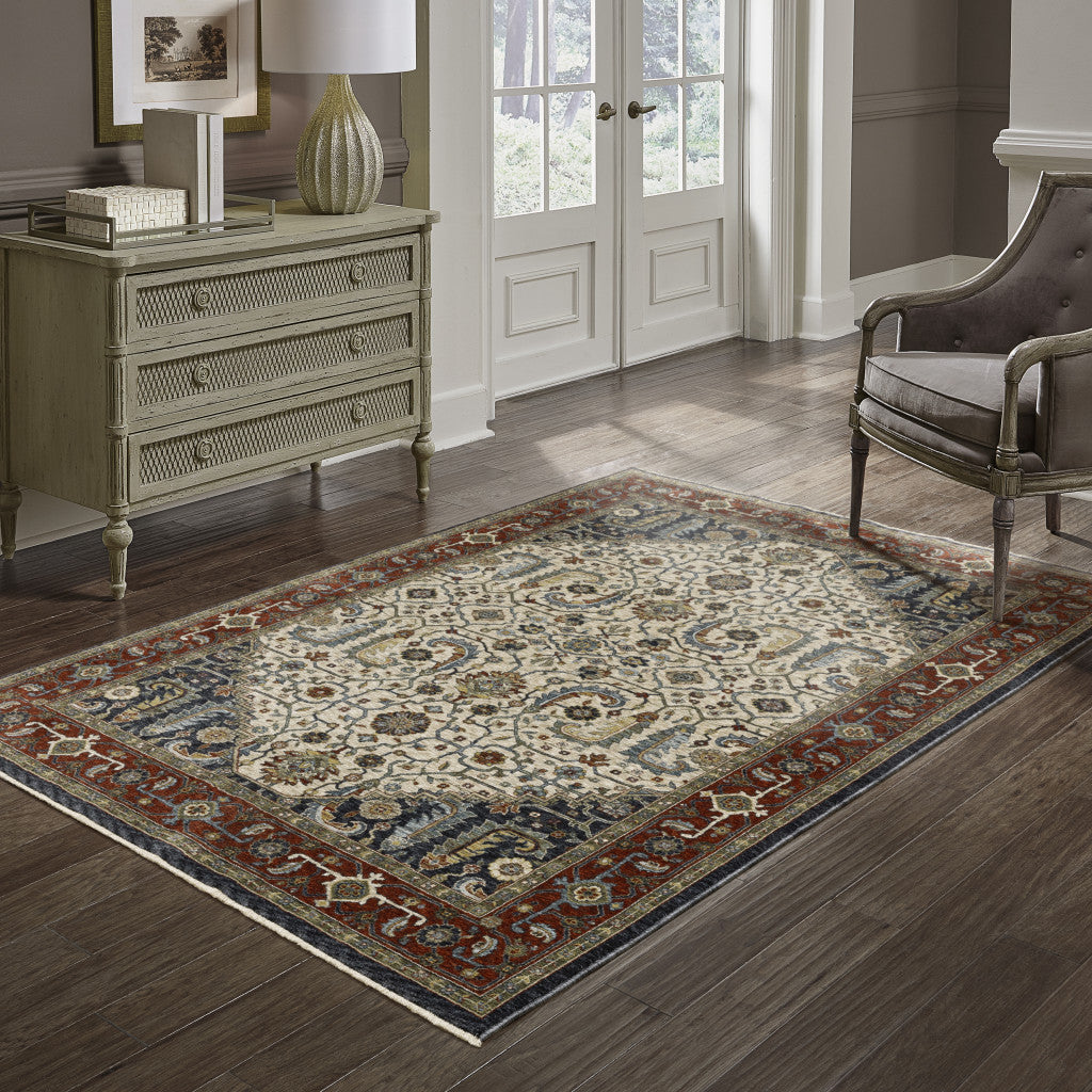 3' X 5' Ivory Beige Red Blue Gold Green And Navy Oriental Power Loom Stain Resistant Area Rug With Fringe