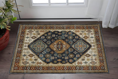 2' X 3' Blue Rust Red Beige Orange Gold And Tan Oriental Power Loom Stain Resistant Area Rug With Fringe