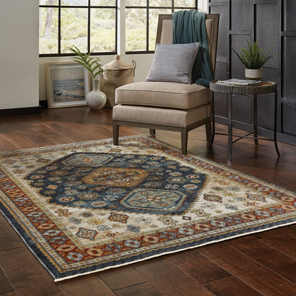 3' X 5' Blue Red Beige Orange Gold And Tan Oriental Power Loom Stain Resistant Area Rug With Fringe