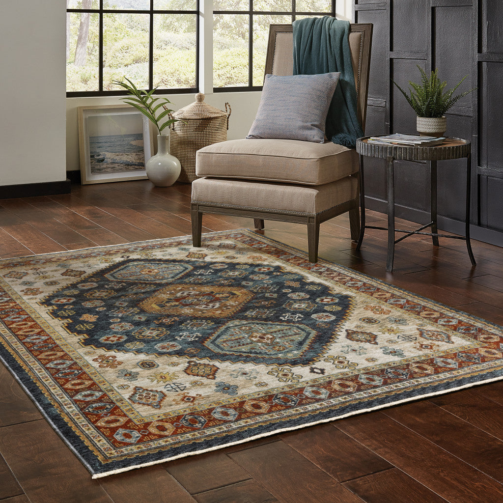 6' X 9' Blue Red Beige Orange Gold And Tan Oriental Power Loom Stain Resistant Area Rug With Fringe