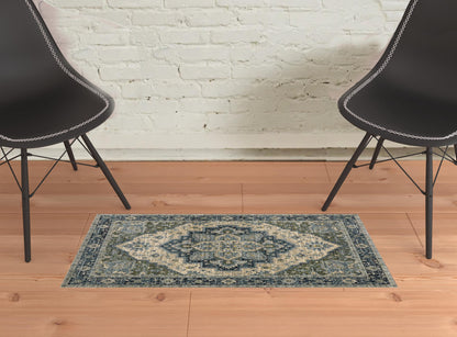 2' X 3' Blue Grey Beige Tan Green And Gold Oriental Power Loom Stain Resistant Area Rug With Fringe