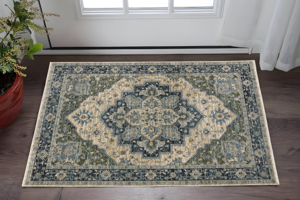 2' X 3' Blue Grey Beige Tan Green And Gold Oriental Power Loom Stain Resistant Area Rug With Fringe