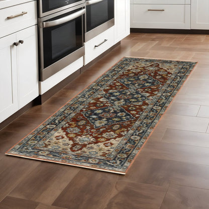 2' X 8' Blue Beige Tan Brown Gold And Rust Red Oriental Power Loom Stain Resistant Runner Rug With Fringe