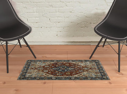 2' X 3' Blue Beige Tan Brown Gold And Rust Red Oriental Power Loom Stain Resistant Area Rug With Fringe