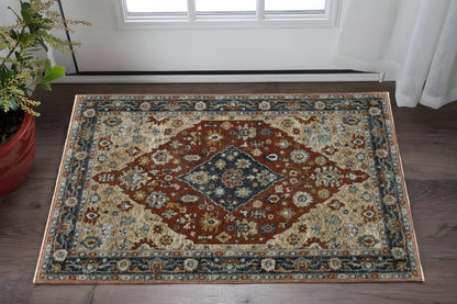 3' X 5' Blue Beige Tan Brown Gold And Rust Red Oriental Power Loom Stain Resistant Area Rug With Fringe