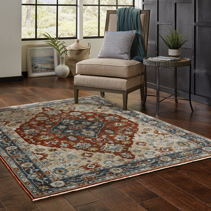 5' X 8' Blue Beige Tan Brown Gold And Rust Red Oriental Power Loom Stain Resistant Area Rug With Fringe