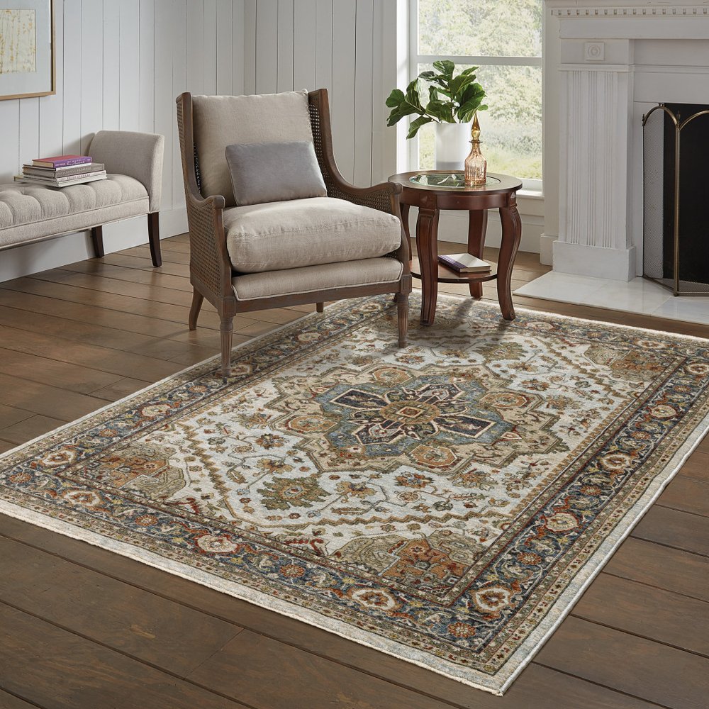 5' X 8' Ivory And Blue Oriental Area Rug With Fringe