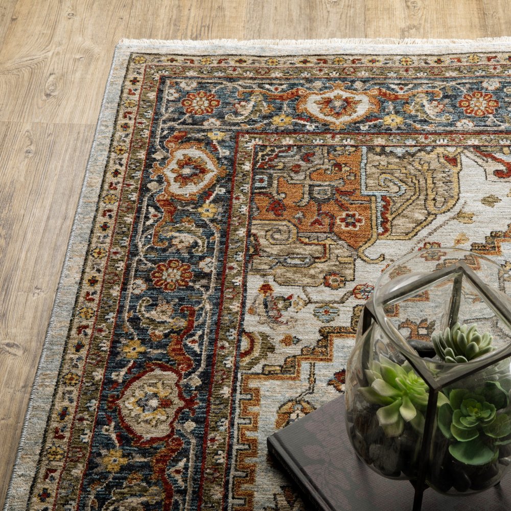 5' X 8' Ivory And Blue Oriental Area Rug With Fringe