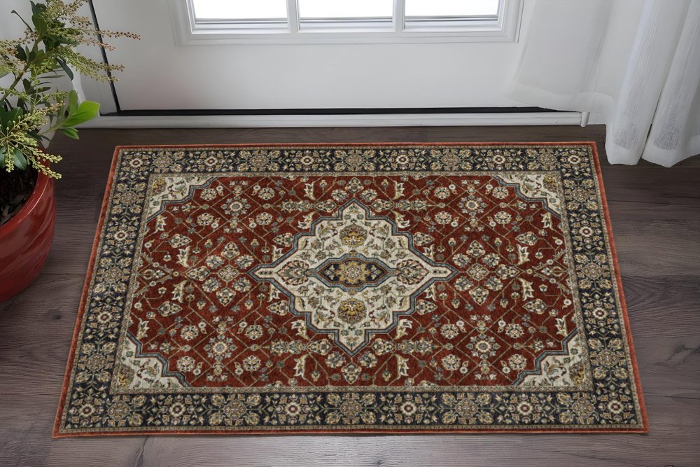 3' X 5' Red And Ivory Oriental Area Rug With Fringe