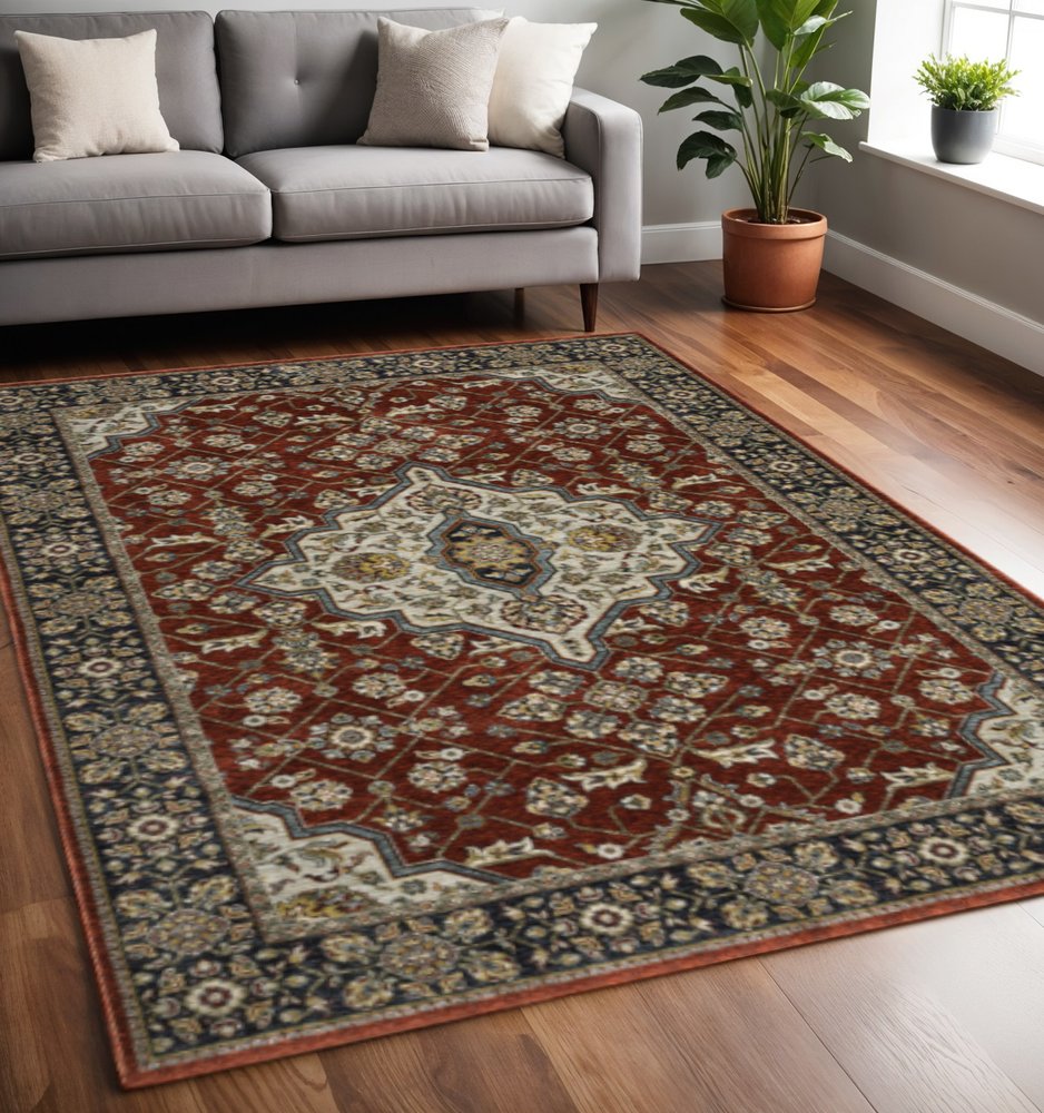 5' X 8' Red Ivory Blue Navy Gold And Grey Oriental Power Loom Stain Resistant Area Rug With Fringe