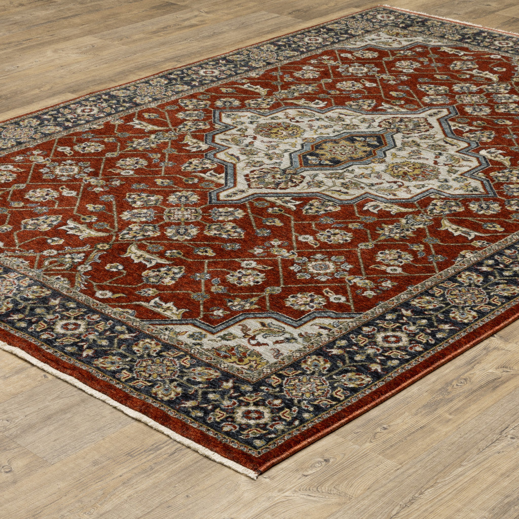 5' X 8' Red Ivory Blue Navy Gold And Grey Oriental Power Loom Stain Resistant Area Rug With Fringe