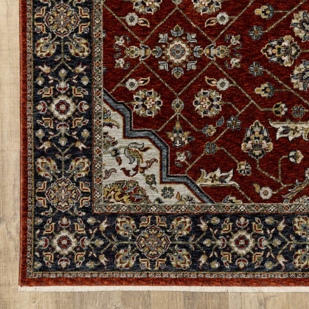 5' X 8' Red Ivory Blue Navy Gold And Grey Oriental Power Loom Stain Resistant Area Rug With Fringe