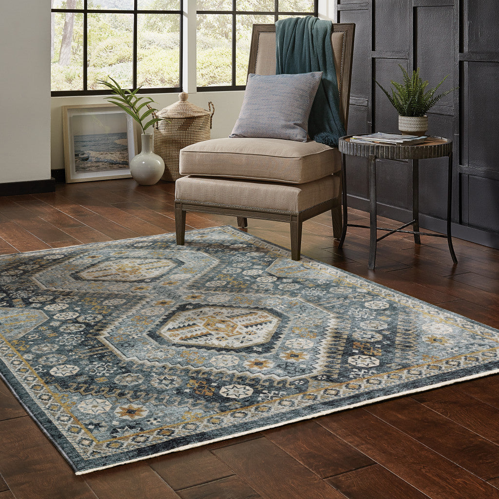 3' X 5' Blue Gold Ivory And Navy Oriental Power Loom Stain Resistant Area Rug With Fringe