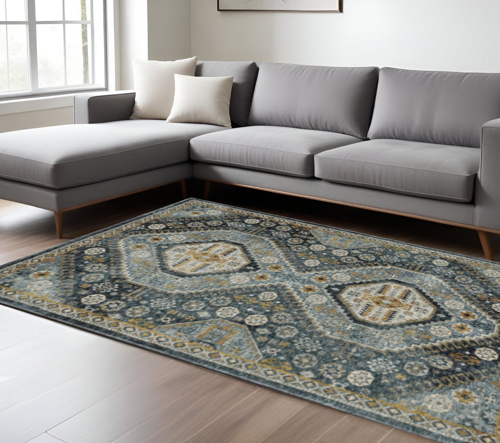10' X 13' Blue Gold Ivory And Navy Oriental Power Loom Stain Resistant Area Rug With Fringe