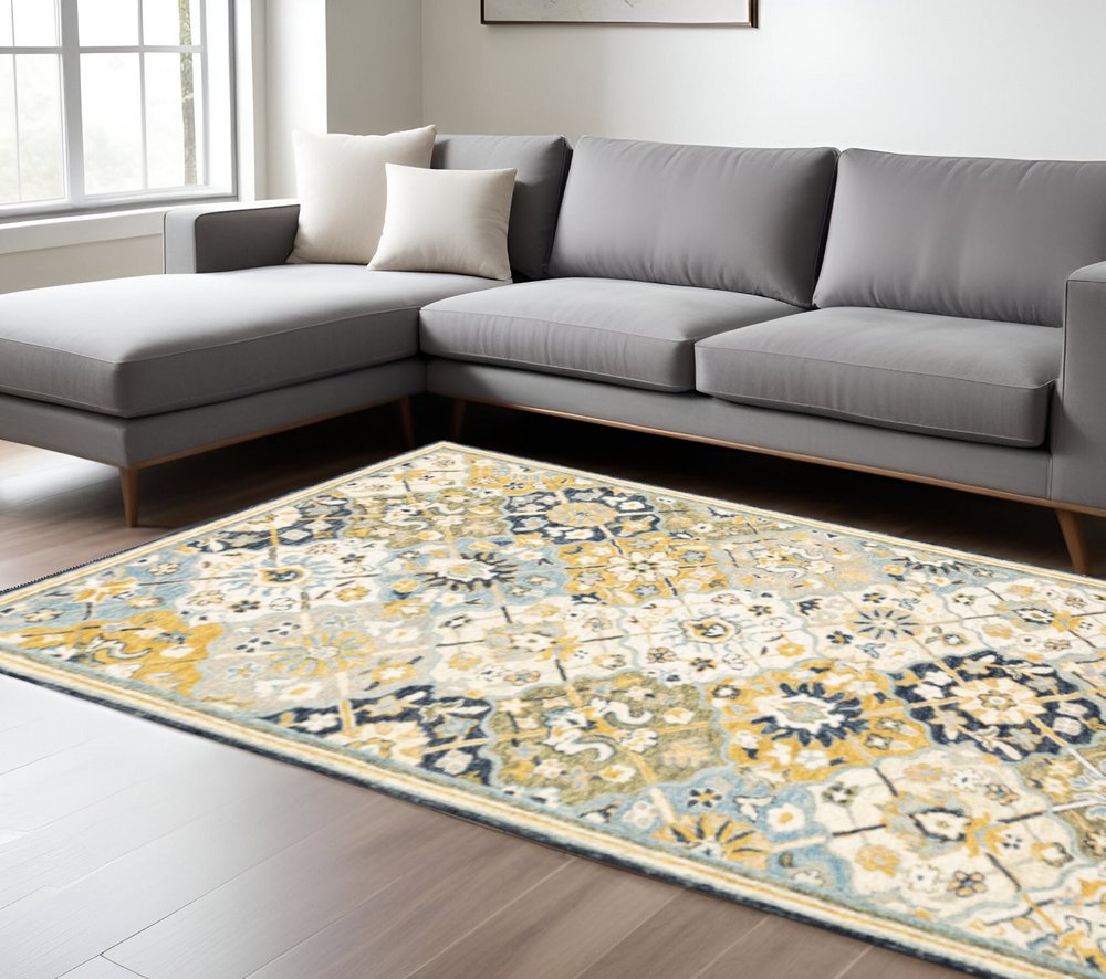 8' X 10' Blue Green Gold Navy And Ivory Geometric Tufted Handmade Stain Resistant Area Rug