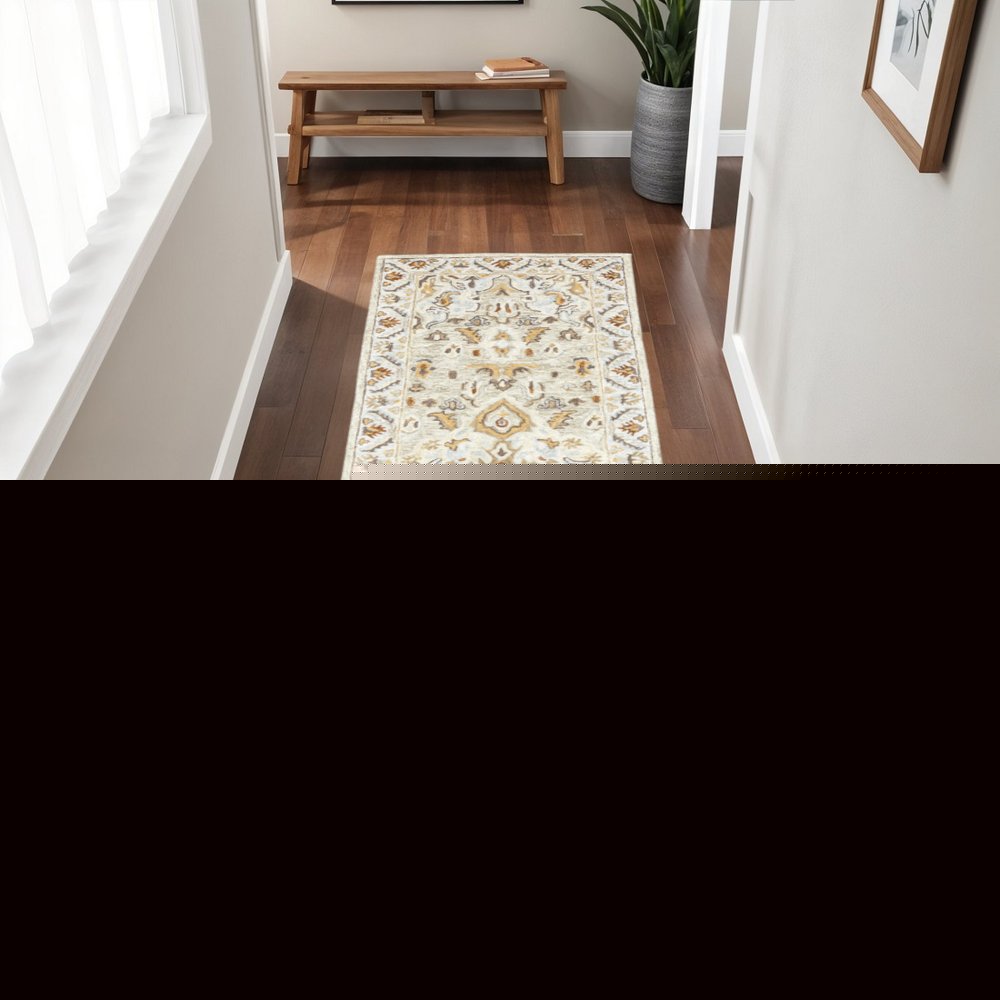 2' X 8' Ivory Beige Gold And Muted Grey Oriental Tufted Handmade Stain Resistant Runner Rug