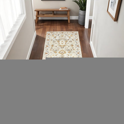 2' X 8' Ivory Beige Gold And Muted Grey Oriental Tufted Handmade Stain Resistant Runner Rug