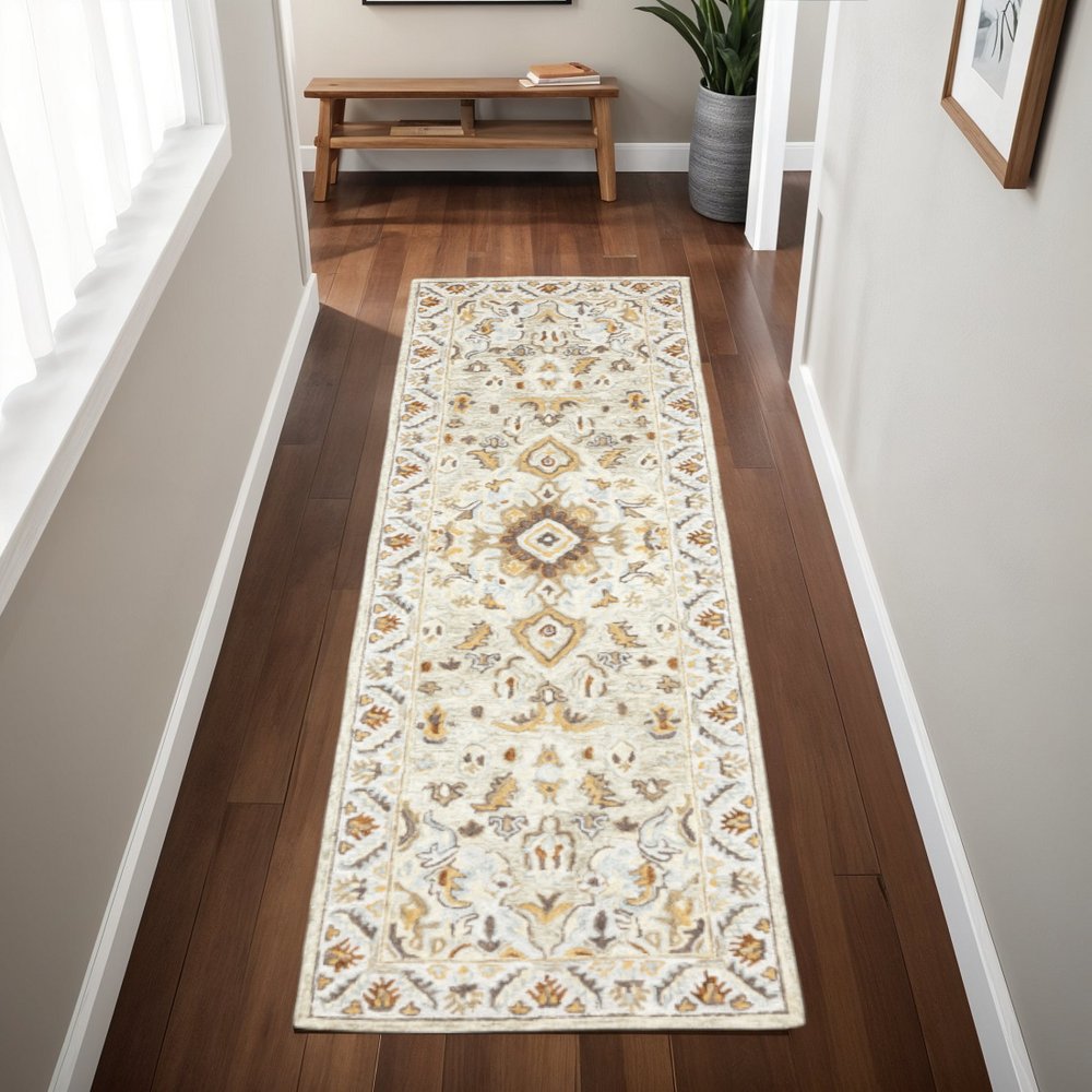 2' X 8' Ivory Beige Gold And Muted Grey Oriental Tufted Handmade Stain Resistant Runner Rug