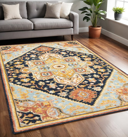 5' X 8' Navy Rust Blue Ivory And Gold Oriental Tufted Handmade Stain Resistant Area Rug