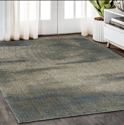 5' X 8' Beige And Blue Abstract Distressed Area Rug