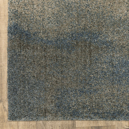 5' X 8' Beige And Blue Abstract Distressed Area Rug
