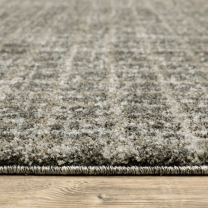 5' X 8' Brown And Beige Geometric Distressed Area Rug