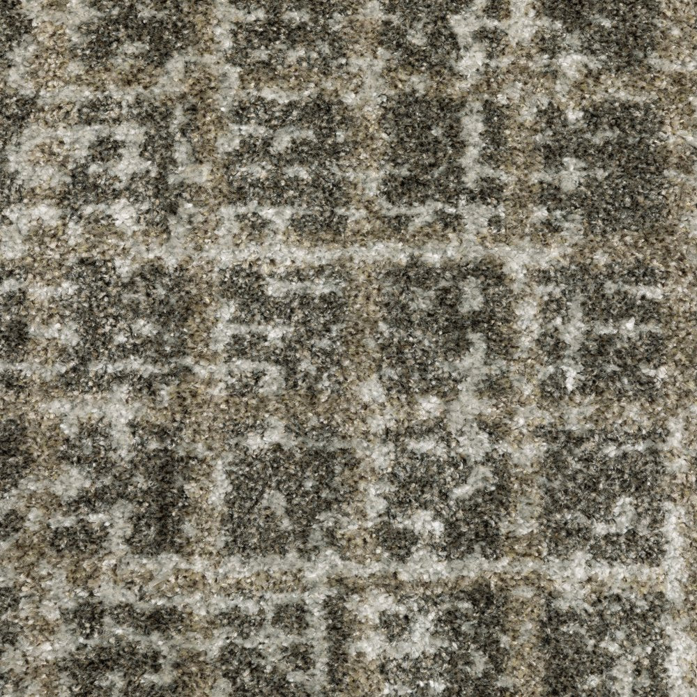 5' X 8' Brown And Beige Geometric Distressed Area Rug